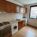 Светъл двустаен апартамент с камина
